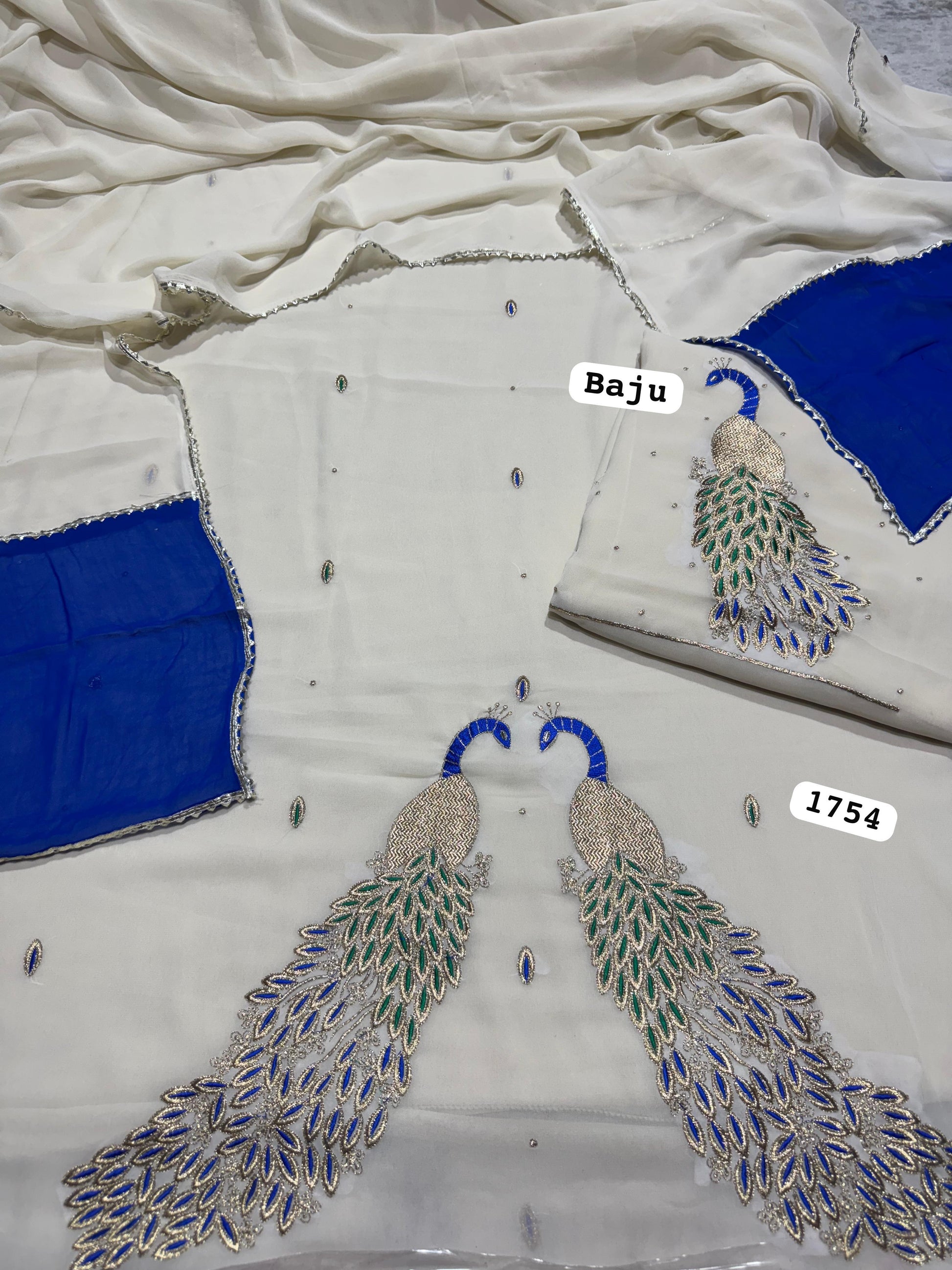 White peacock suit